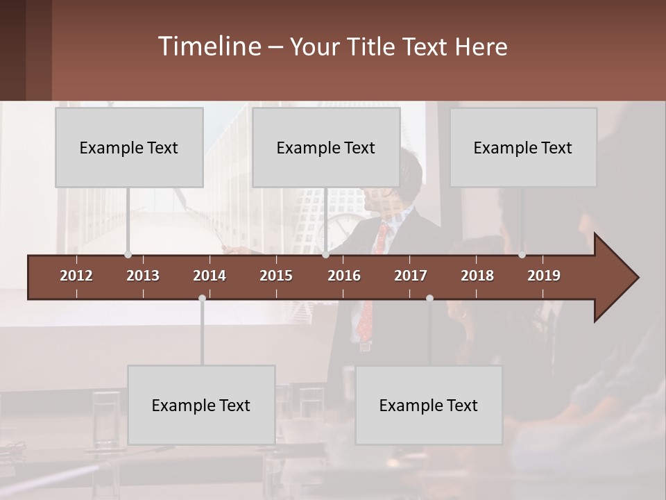 A Man Giving A Presentation To A Group Of People PowerPoint Template