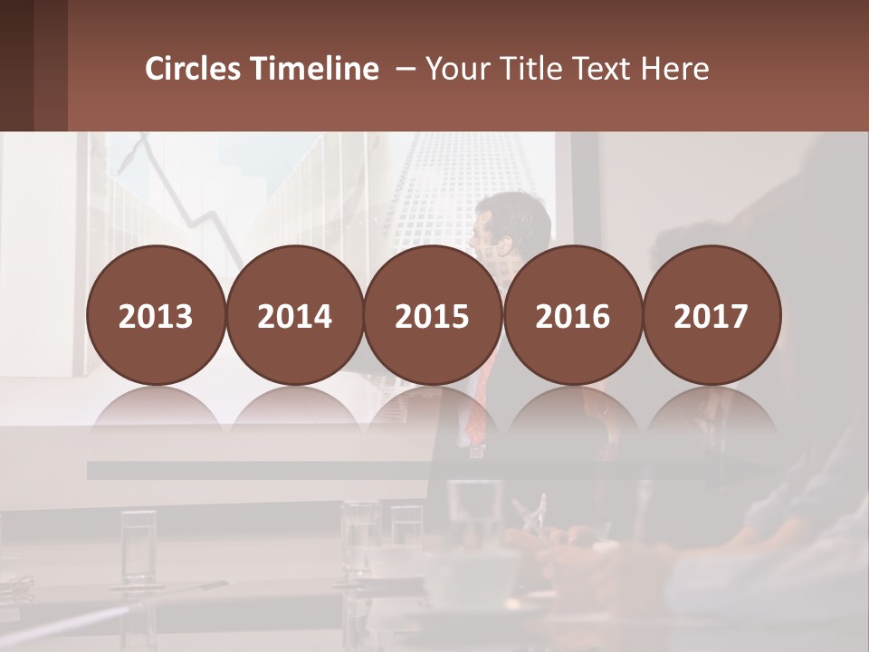 A Man Giving A Presentation To A Group Of People PowerPoint Template