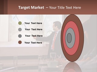 A Man Giving A Presentation To A Group Of People PowerPoint Template