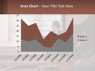 A Man Giving A Presentation To A Group Of People PowerPoint Template