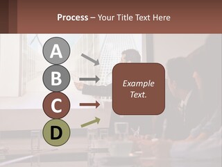 A Man Giving A Presentation To A Group Of People PowerPoint Template