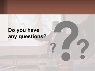 A Man Giving A Presentation To A Group Of People PowerPoint Template