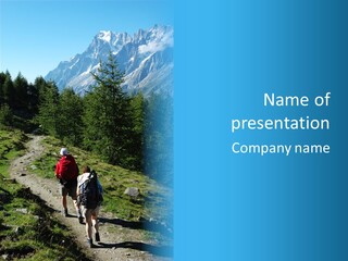 Two People Hiking Up A Trail In The Mountains PowerPoint Template