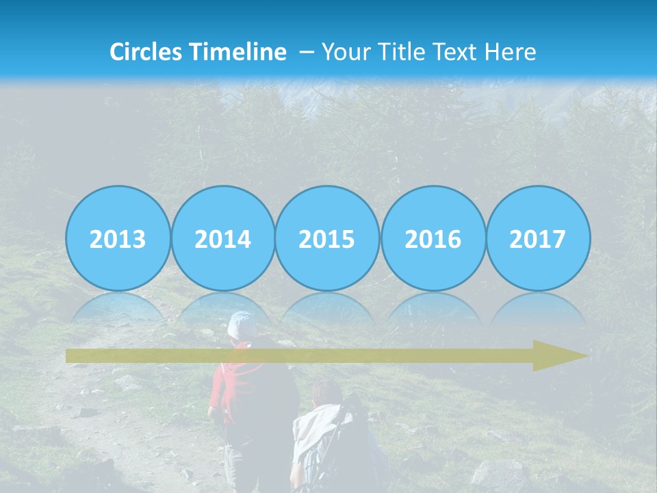 Two People Hiking Up A Trail In The Mountains PowerPoint Template