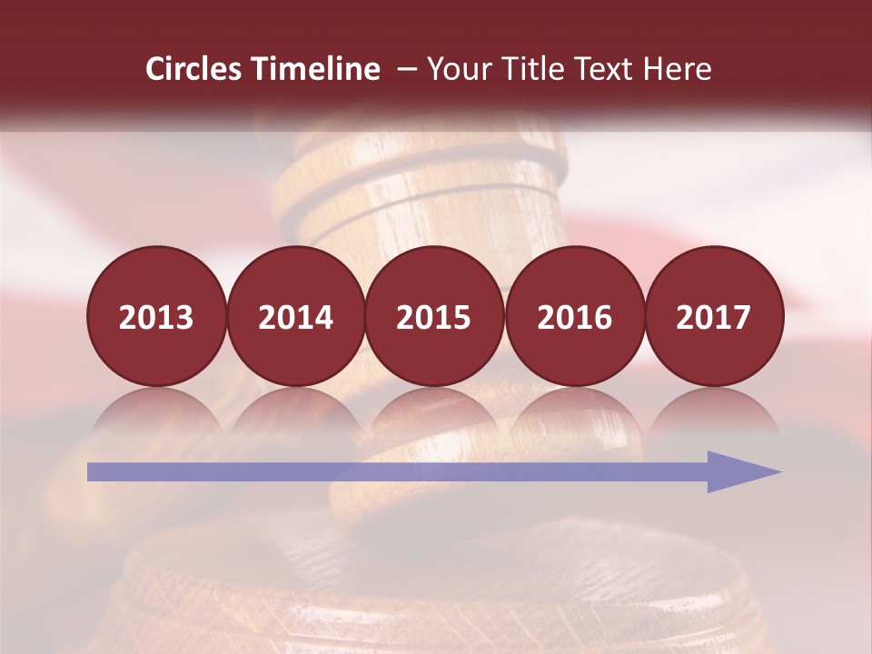 A Wooden Judge's Hammer On Top Of A Wooden Table PowerPoint Template