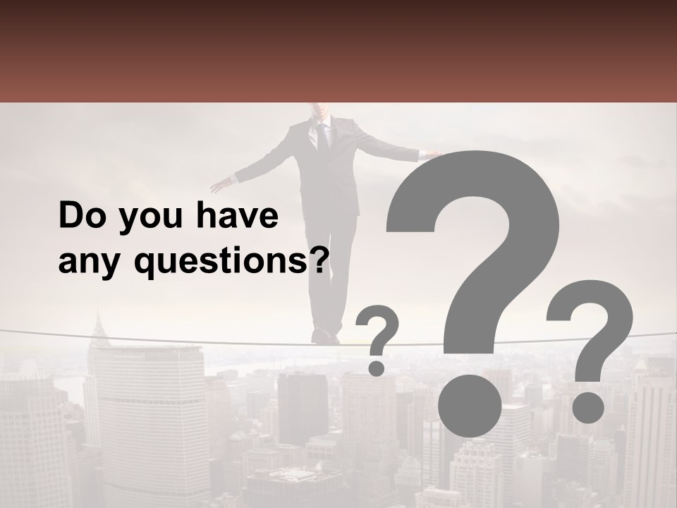 A Man Walking On A Tight Rope Over A City PowerPoint Template