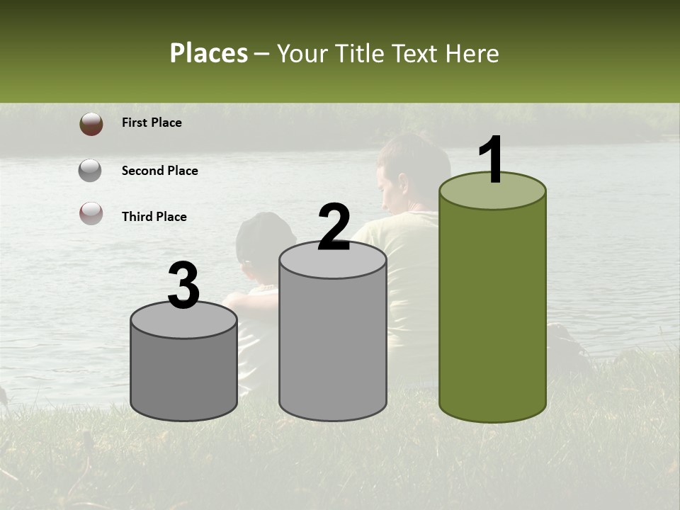 A Man And A Child Sitting On The Grass Near A Body Of Water PowerPoint Template