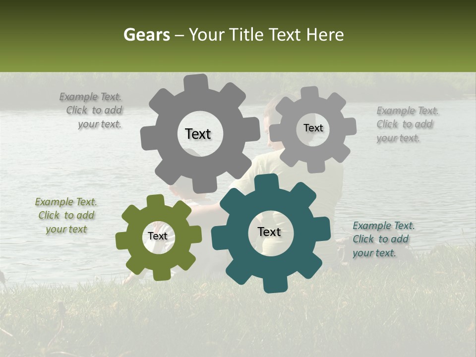 A Man And A Child Sitting On The Grass Near A Body Of Water PowerPoint Template