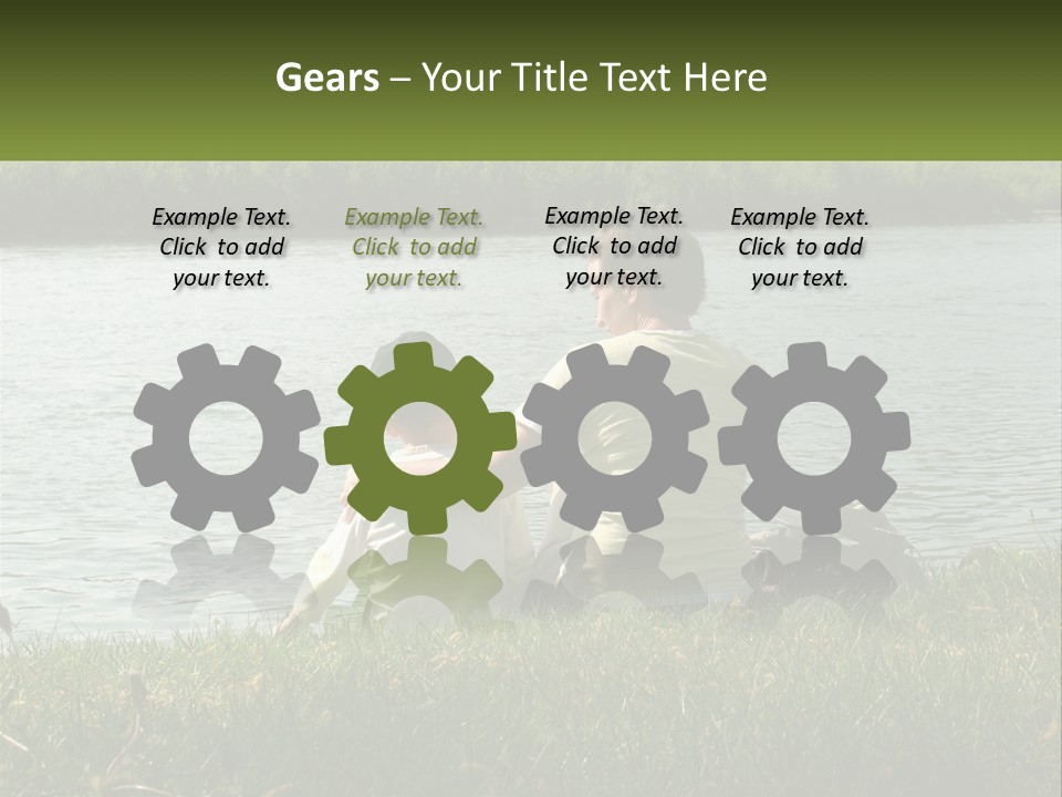 A Man And A Child Sitting On The Grass Near A Body Of Water PowerPoint Template