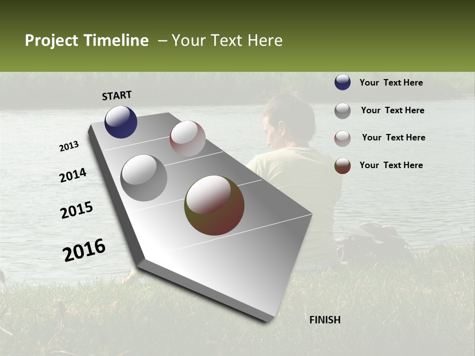 A Man And A Child Sitting On The Grass Near A Body Of Water PowerPoint Template