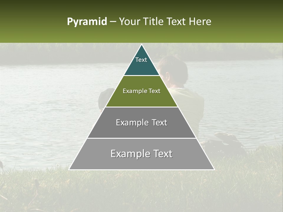 A Man And A Child Sitting On The Grass Near A Body Of Water PowerPoint Template