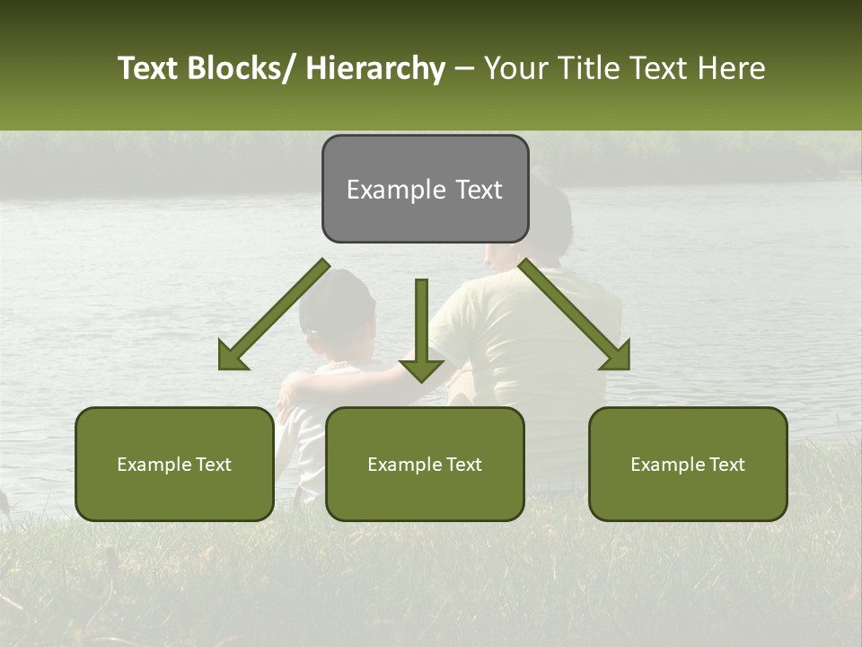 A Man And A Child Sitting On The Grass Near A Body Of Water PowerPoint Template