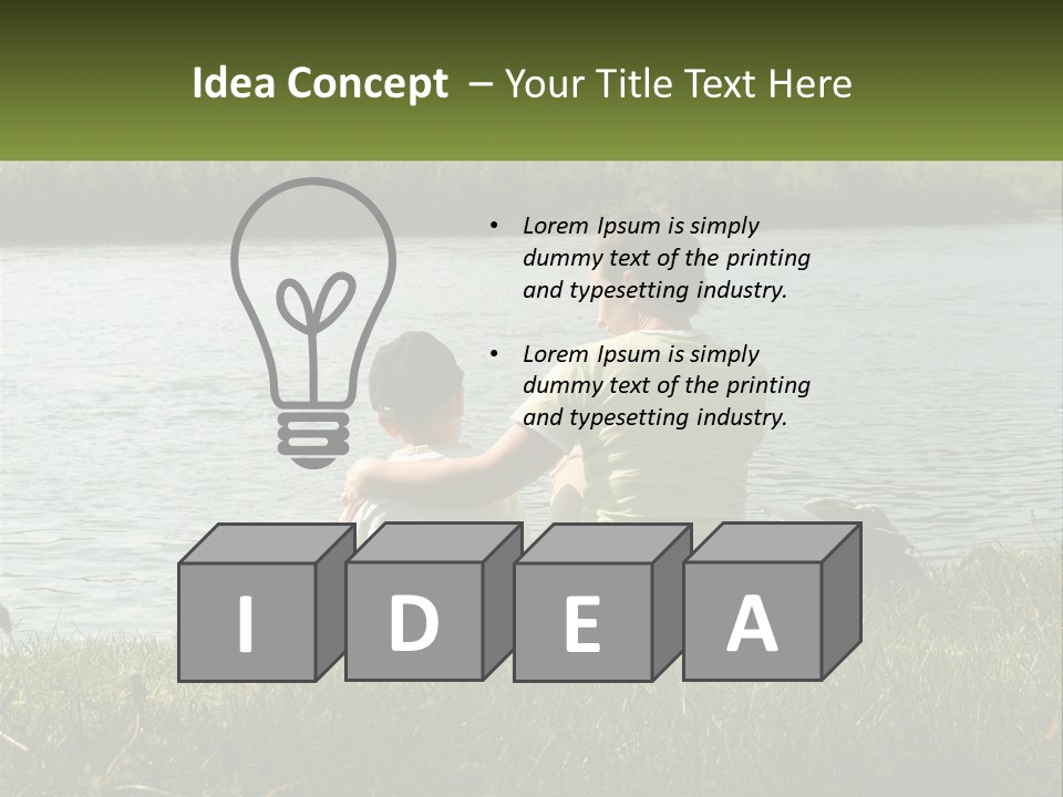 A Man And A Child Sitting On The Grass Near A Body Of Water PowerPoint Template