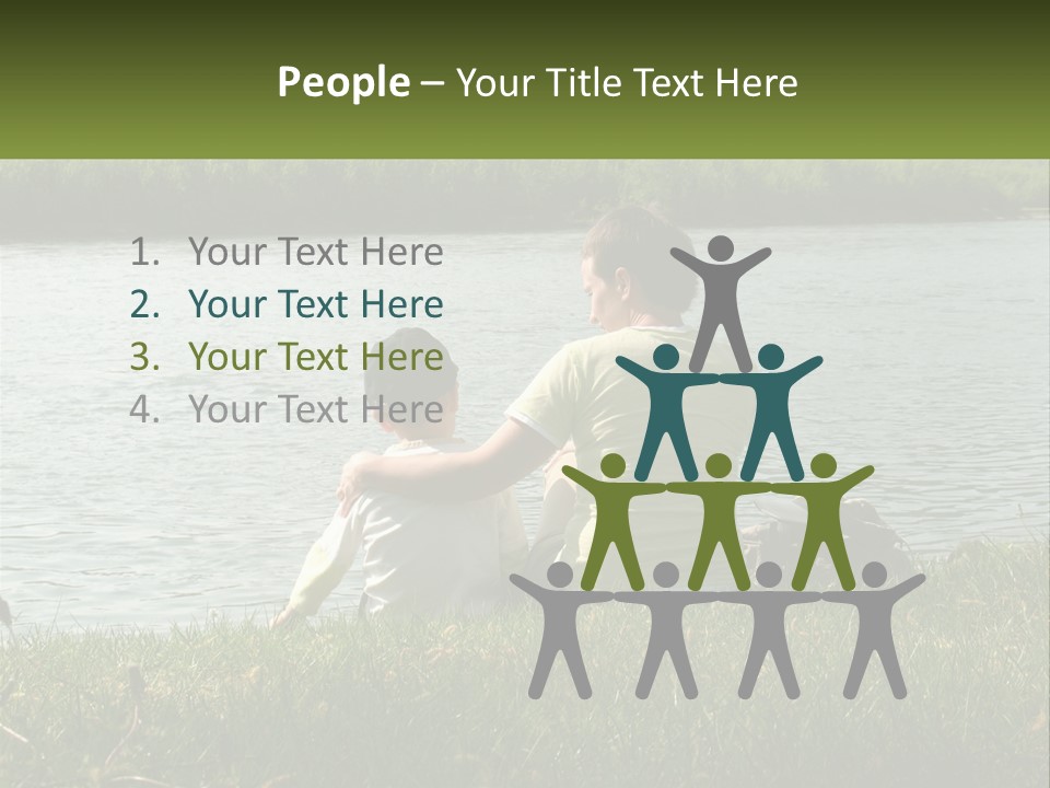 A Man And A Child Sitting On The Grass Near A Body Of Water PowerPoint Template