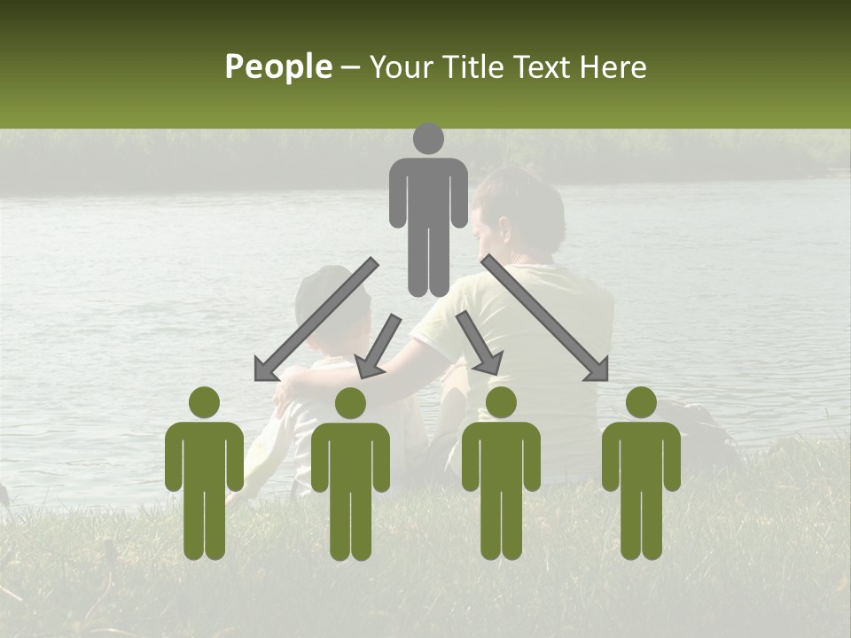 A Man And A Child Sitting On The Grass Near A Body Of Water PowerPoint Template