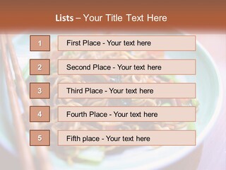 A Plate Of Noodles With Chopsticks On A Table PowerPoint Template