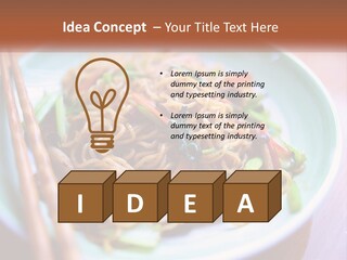 A Plate Of Noodles With Chopsticks On A Table PowerPoint Template