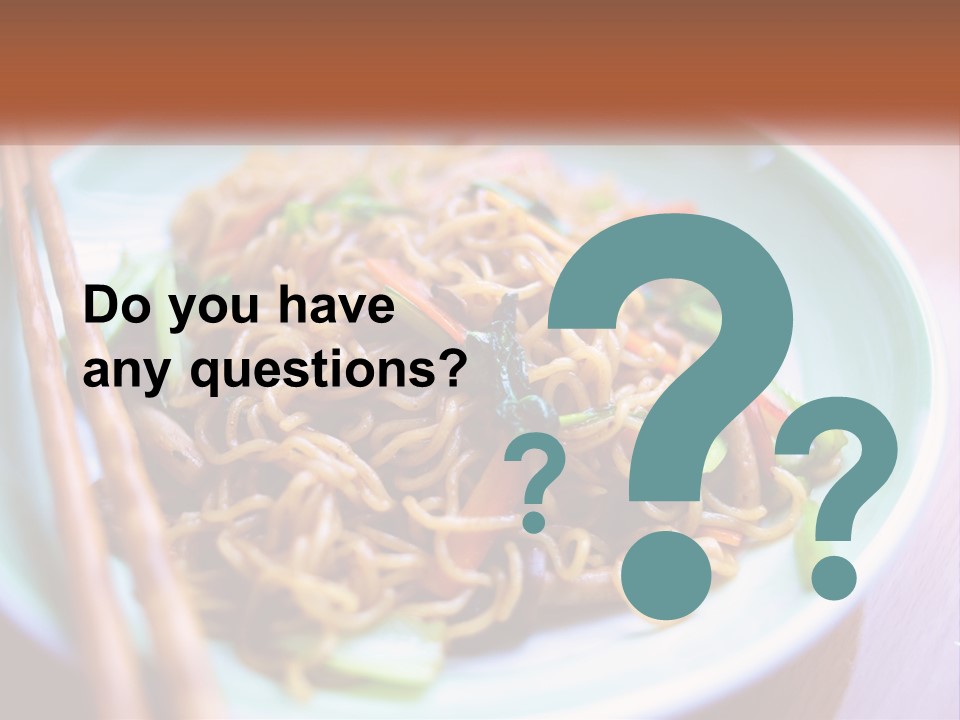 A Plate Of Noodles With Chopsticks On A Table PowerPoint Template