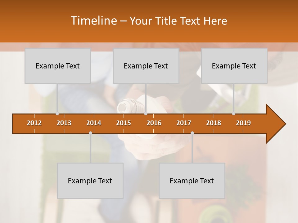 A Man And Woman Sitting On A Couch In A Living Room PowerPoint Template