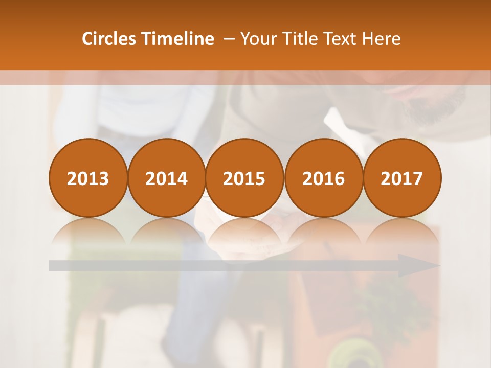 A Man And Woman Sitting On A Couch In A Living Room PowerPoint Template