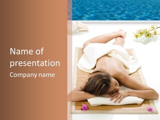 A Woman Laying On A Mat With A Towel On It PowerPoint Template