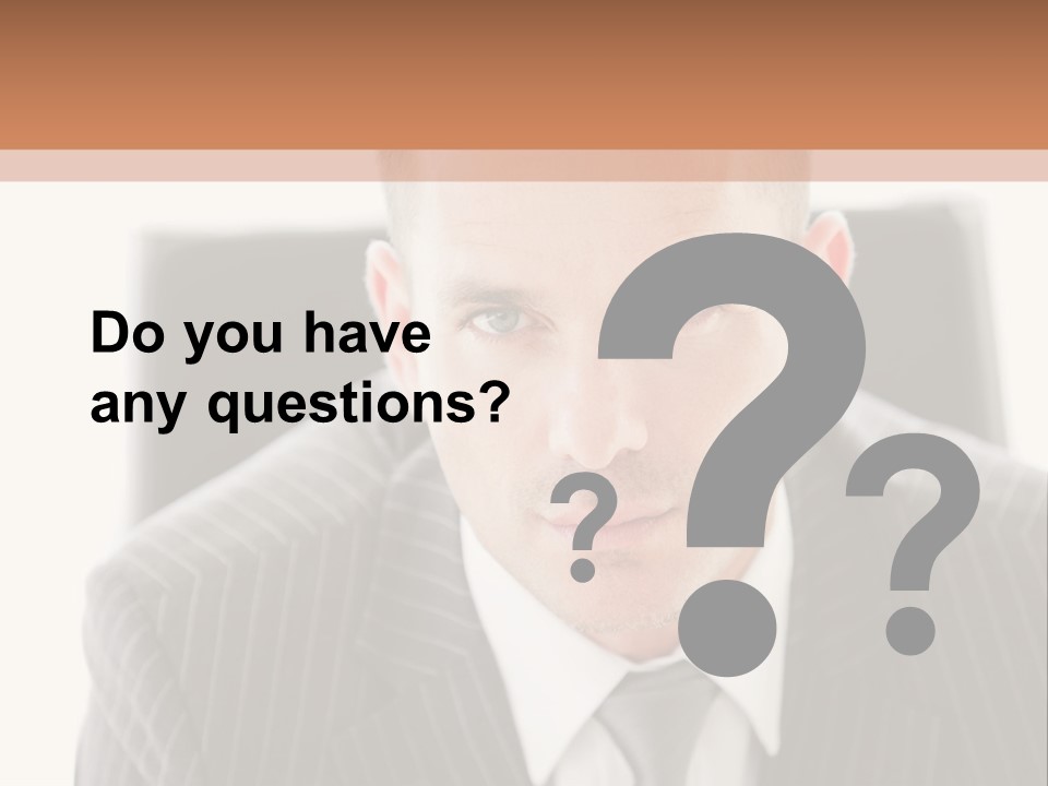 A Man In A Suit Is Looking At The Camera PowerPoint Template
