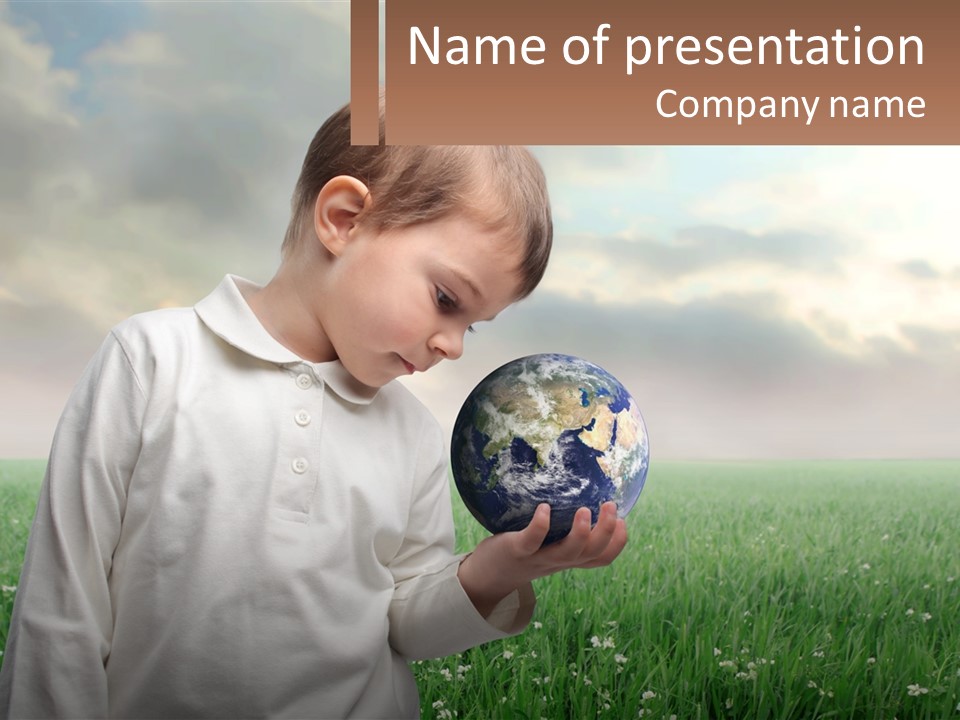 A Young Boy Holding A Globe In His Hands PowerPoint Template