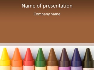 A Row Of Crayons With A Brown Background PowerPoint Template