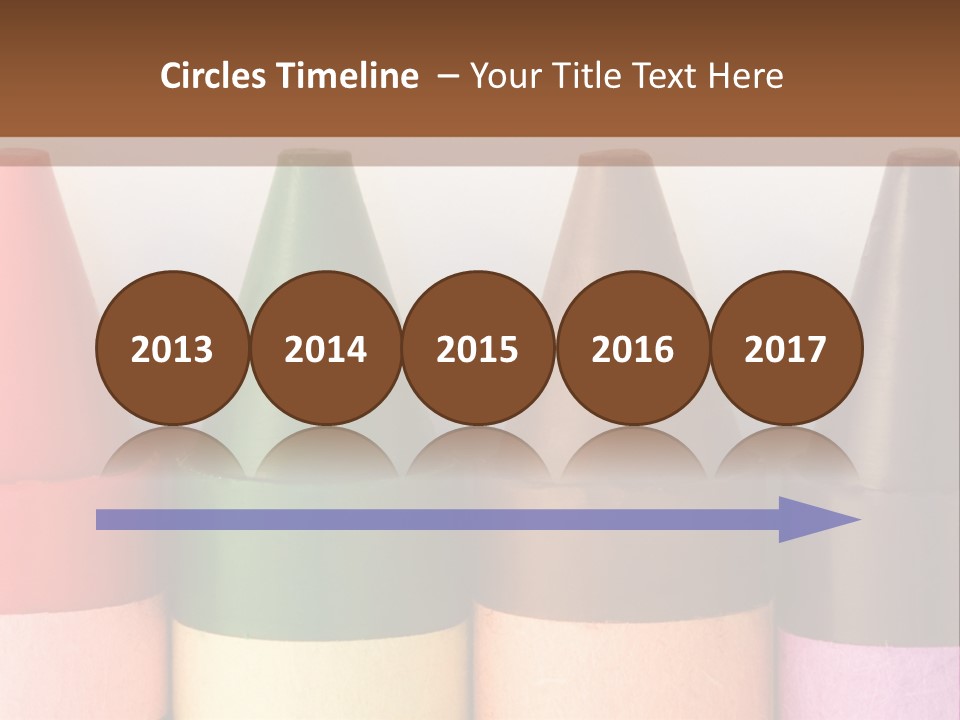 A Row Of Crayons With A Brown Background PowerPoint Template