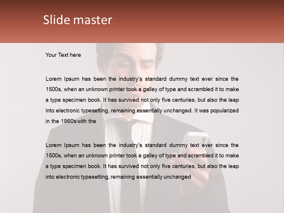 A Man In A Suit Looking At His Cell Phone PowerPoint Template