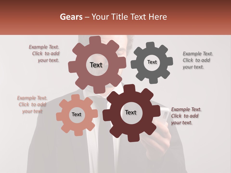 A Man In A Suit Looking At His Cell Phone PowerPoint Template