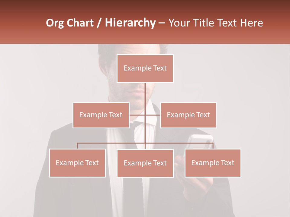 A Man In A Suit Looking At His Cell Phone PowerPoint Template