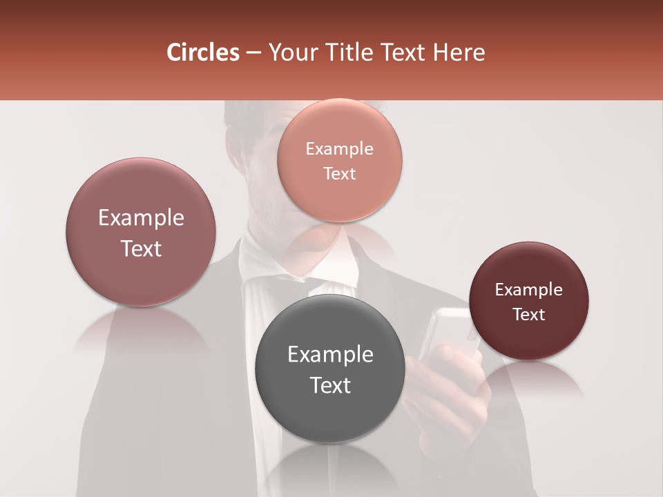 A Man In A Suit Looking At His Cell Phone PowerPoint Template