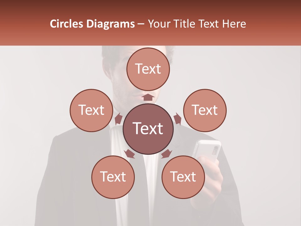 A Man In A Suit Looking At His Cell Phone PowerPoint Template