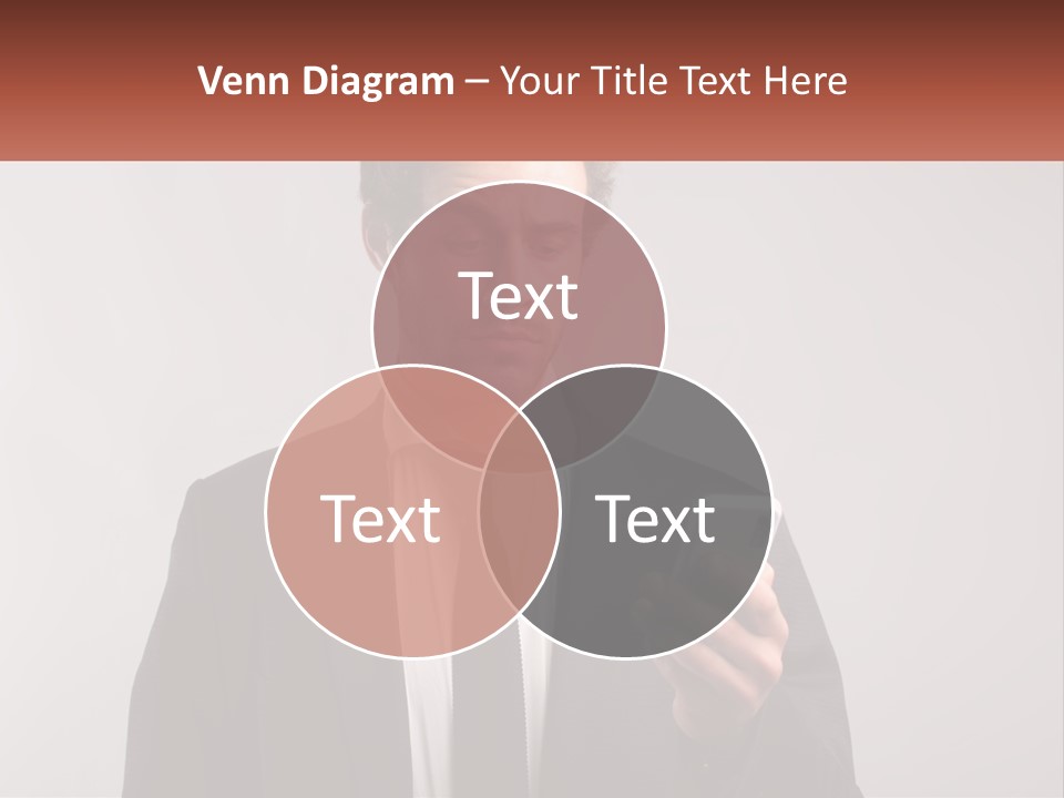A Man In A Suit Looking At His Cell Phone PowerPoint Template