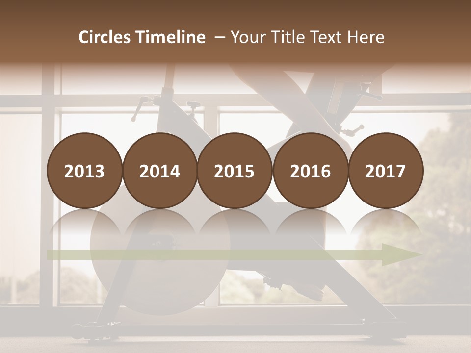 A Woman Riding A Stationary Bike In A Gym PowerPoint Template