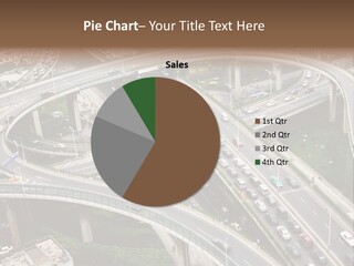 An Aerial View Of A Busy Highway Intersection PowerPoint Template