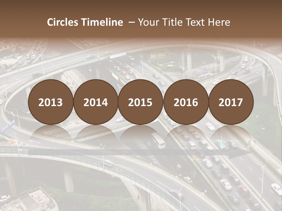 An Aerial View Of A Busy Highway Intersection PowerPoint Template