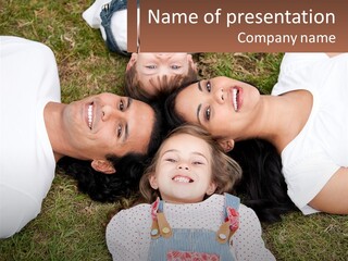 A Group Of People Laying On Top Of A Grass Covered Field PowerPoint Template