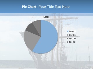 A Boat Is Docked In The Water Next To A Dock PowerPoint Template
