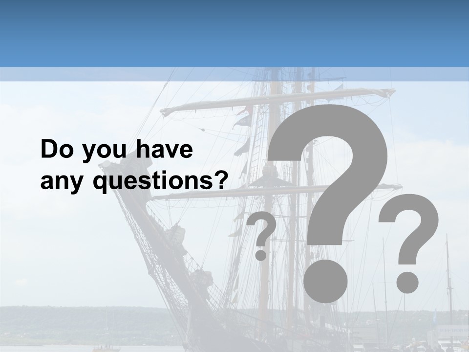 A Boat Is Docked In The Water Next To A Dock PowerPoint Template