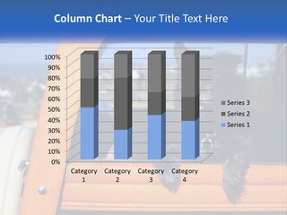 A Small Black Dog Sitting In The Back Of A Truck PowerPoint Template