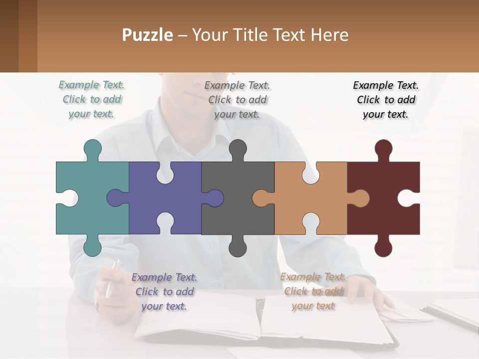 A Man Sitting At A Desk In Front Of A Computer PowerPoint Template