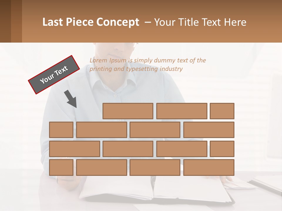 A Man Sitting At A Desk In Front Of A Computer PowerPoint Template