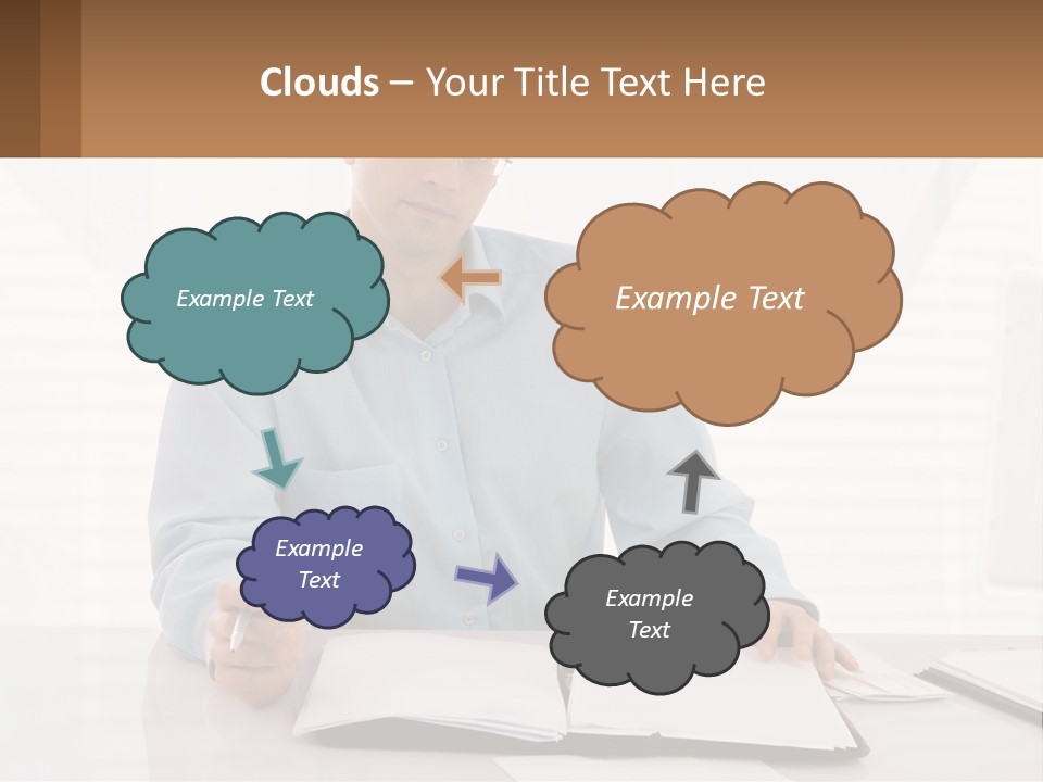 A Man Sitting At A Desk In Front Of A Computer PowerPoint Template