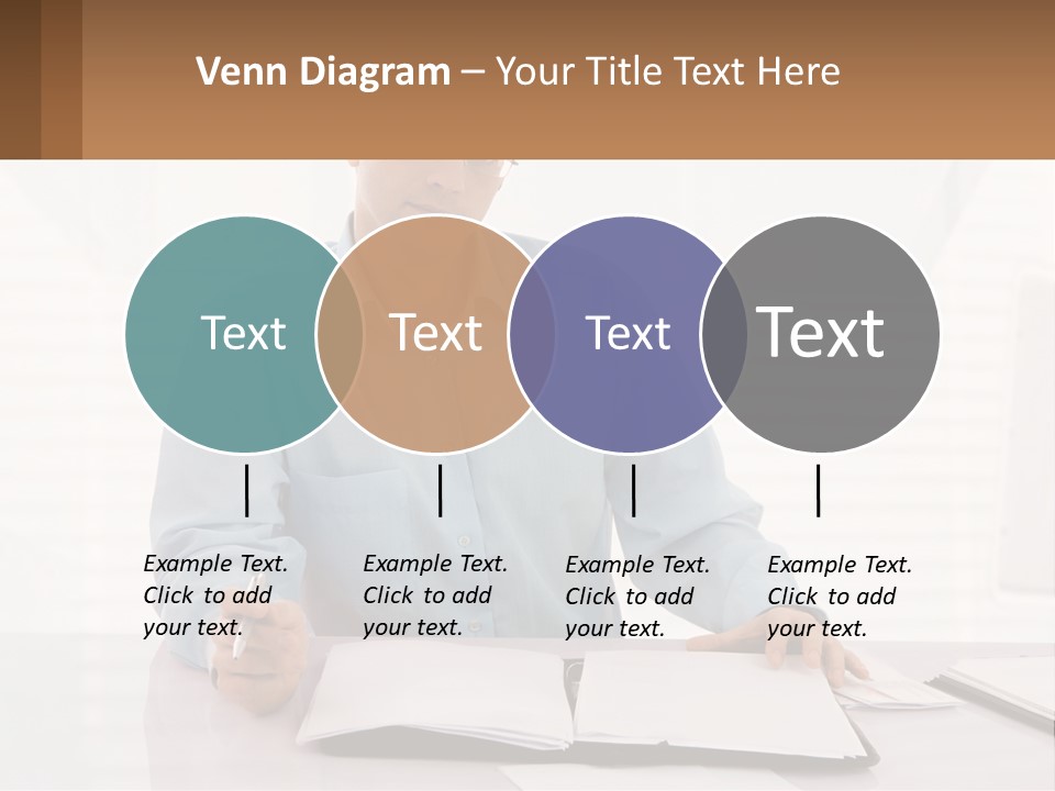 A Man Sitting At A Desk In Front Of A Computer PowerPoint Template