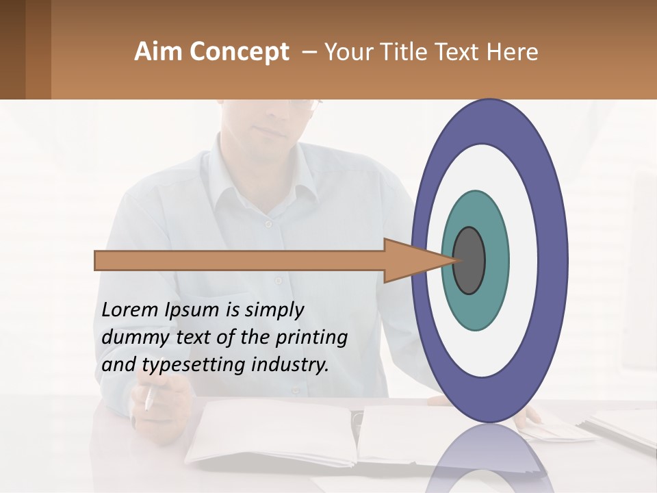 A Man Sitting At A Desk In Front Of A Computer PowerPoint Template