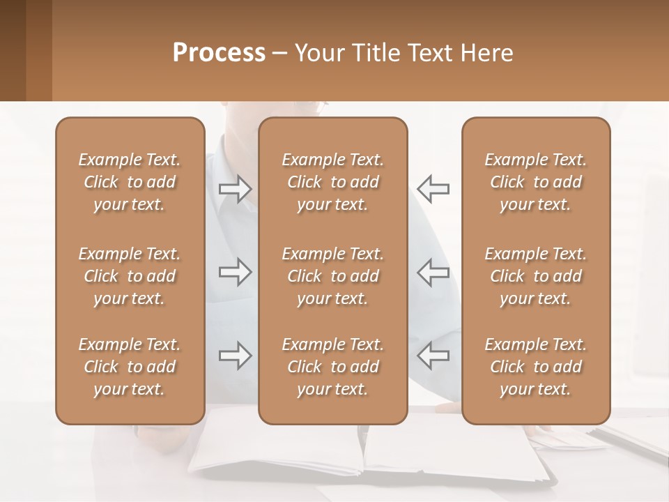 A Man Sitting At A Desk In Front Of A Computer PowerPoint Template
