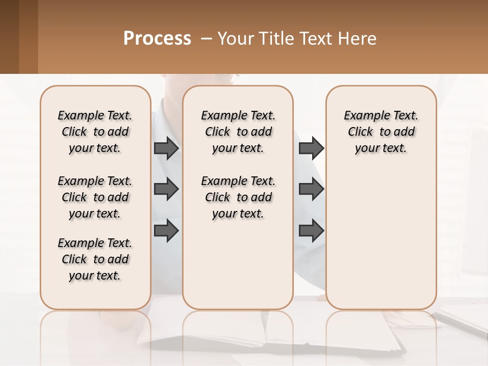 A Man Sitting At A Desk In Front Of A Computer PowerPoint Template