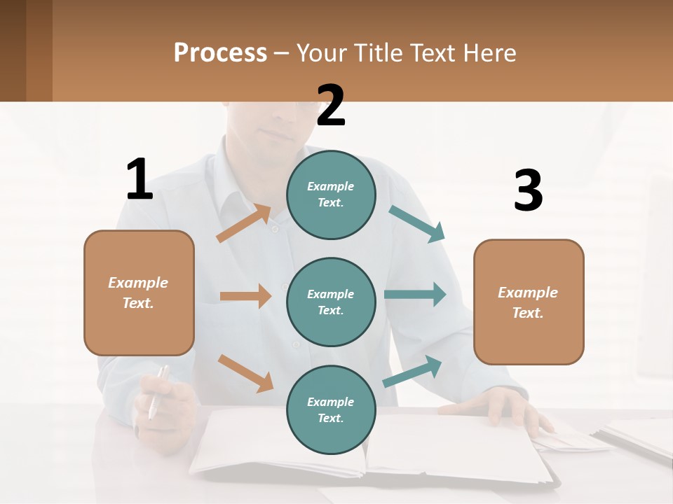 A Man Sitting At A Desk In Front Of A Computer PowerPoint Template